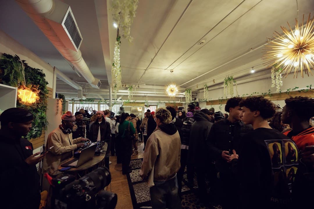 Guests talking at a past event inside TRiBE Co