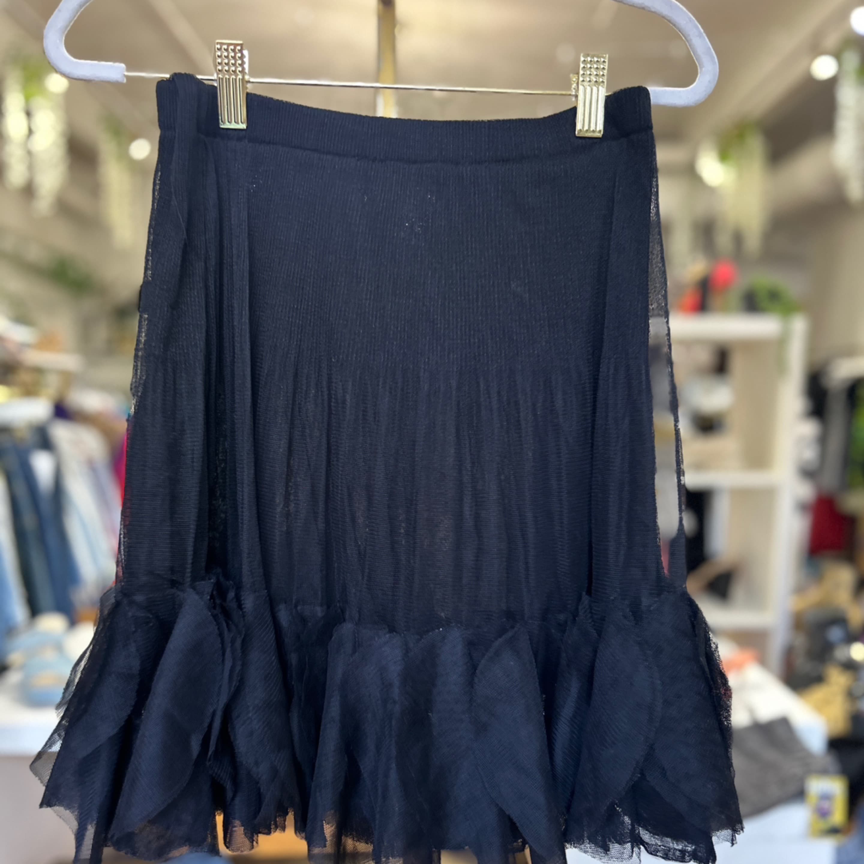 Size medium, short black A-line skirt
